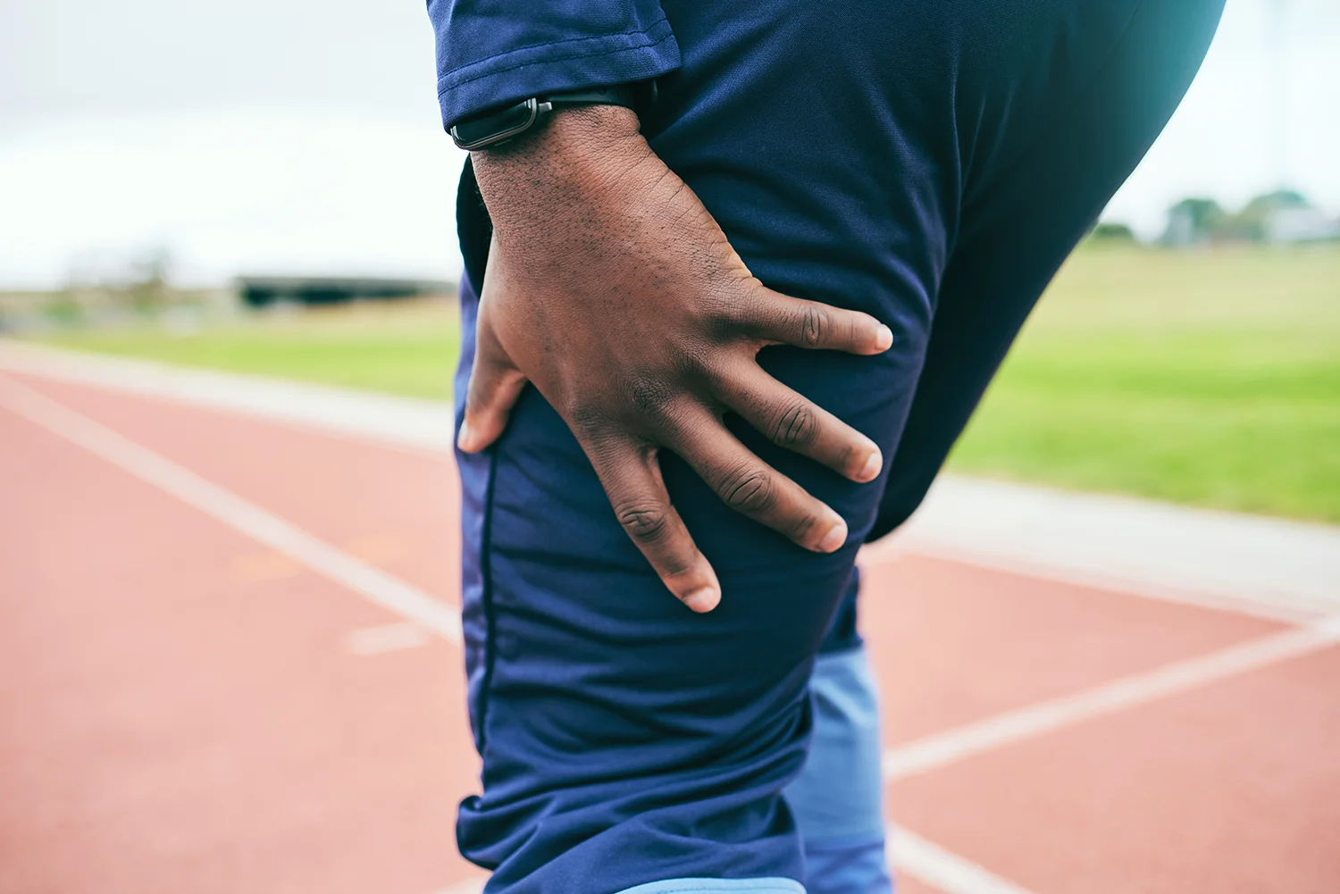 leg pain injury and black man runner