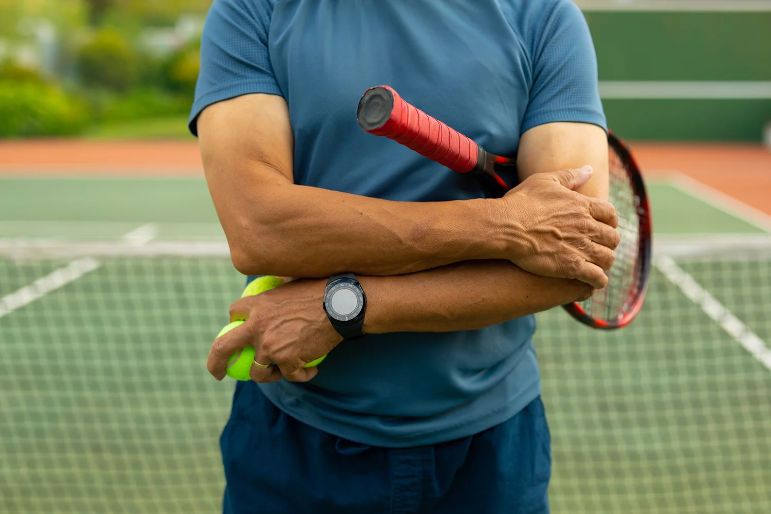 midsection of biracial senior man with arms