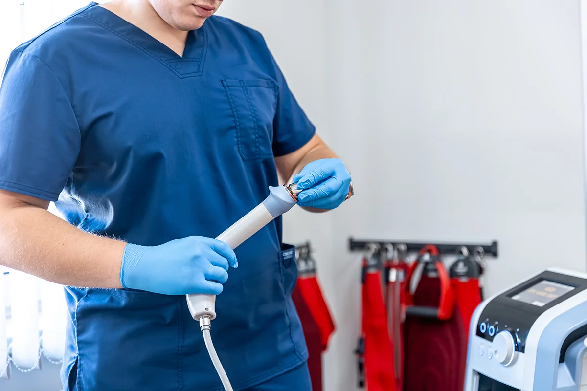 medical professional prepares equipment