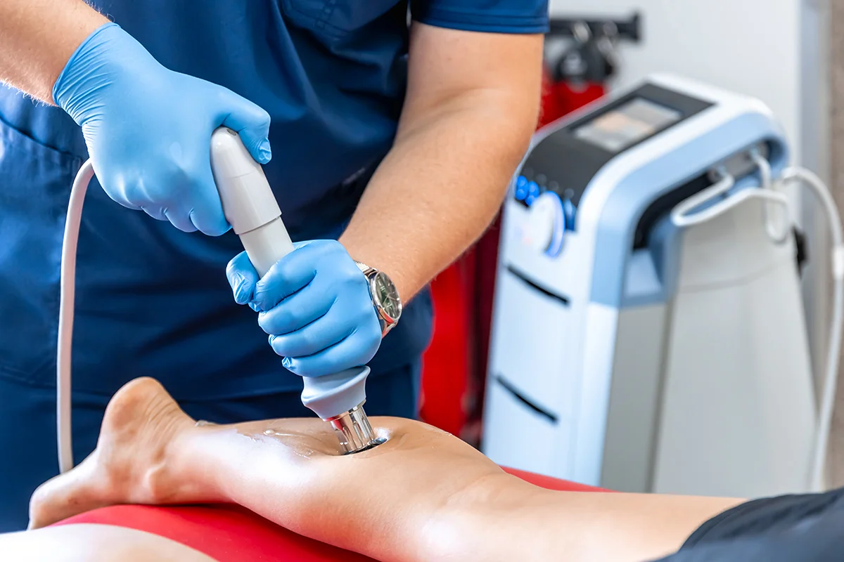 physical therapist treating patient 1